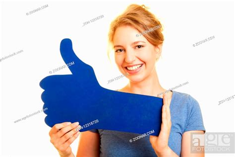 Junge blonde Frau hält blauen Daumen hoch als Like Konzept Stock Photo Picture And Rights