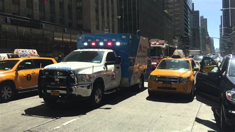 MOUNT SINAI AMBULANCE CLEARING WAY FOR FDNY ENGINE 65 RESPONDING ON 6TH