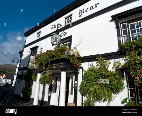 Exterior front view of The Bear Hotel and sign Crickhowell, Powys ...