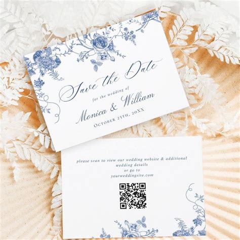 Two Wedding Cards Sitting On Top Of Each Other Next To Some Paper