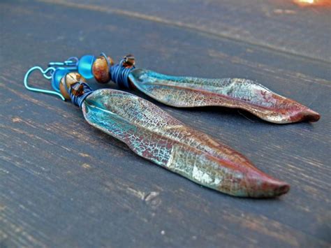 Pin on Paper and other handmade Beads | Polymer clay jewelry, Clay ...