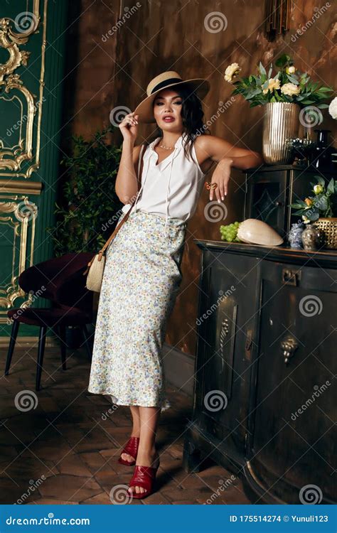 Young Pretty Rich Italian Woman In Golden Luxury Room Interior Elegant