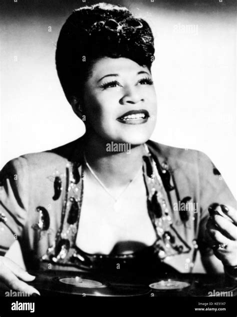 Fitzgerald Ella With Pile Of Records In Front Of Her In 1940s American