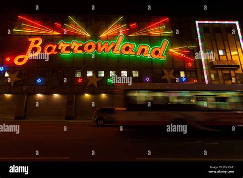 An illuminated sign for Barrowland Ballroom at night in Glasgow Scotland. It is famous for ...