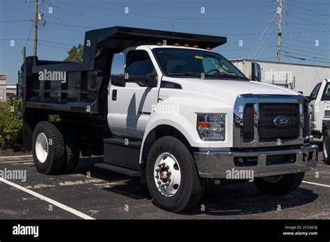 Indianapolis - Circa August 2020: Ford F750 Dump Truck at a dealership. Ford sells products ...