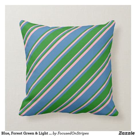 A Green And White Striped Pillow