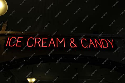 Premium Photo | Vintage Ice Cream and Candy Neon Sign in Old Store