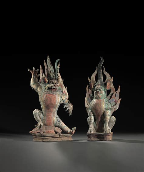 A Magnificent Pair Of Painted Pottery Figures Of Earth Spirits