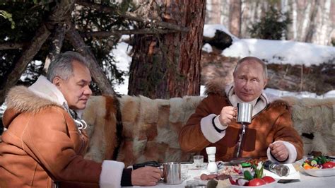 Vladimir Putin Poses In Sheepskin On Snowy Siberian Retreat As Tensions