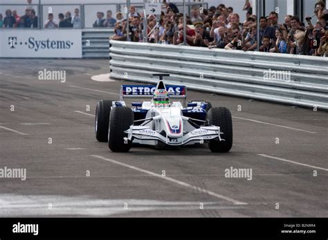 Augusto Farfus Driving A BMW Sauber Formula One Car At The Pit Lane