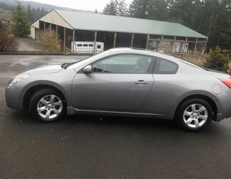 Nissan Altima Coupe Photos And Specs Photo Altima Coupe Nissan Auto