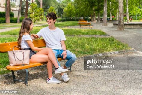 Couple On A Park Bench Photos And Premium High Res Pictures Getty Images