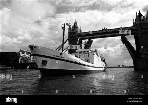 Passing under Tower bridge, Pool of London, the Sir Walter Raleigh ...