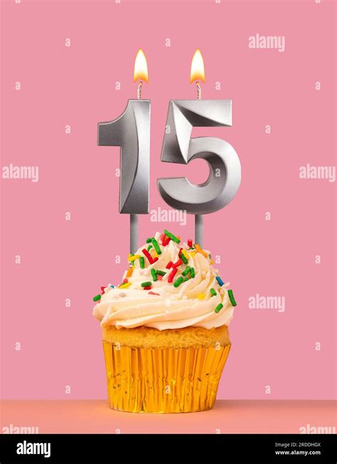 Birthday card with cupcake and candle number 15 Stock Photo - Alamy