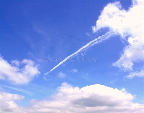 Sky Clouds Plane Tracks In The Sky Blue Stock Photo Image Of Blue