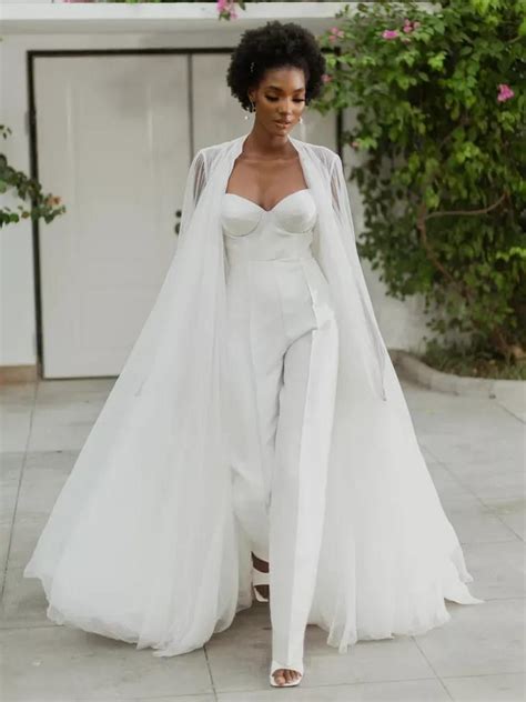 Stunning Wedding Dresses With Capes To Trail Behind You Down The