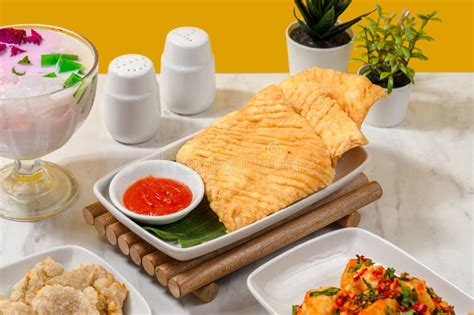 Various Types Of Food That Are Dipped In Flour Batter And Then Fried In