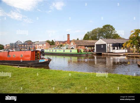 Canal Narrowboat Passing Through Stone Staffordshire On The Trent And