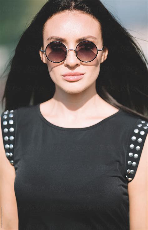 Trendy Woman With Round Sunglasses By Stocksy Contributor Alexey