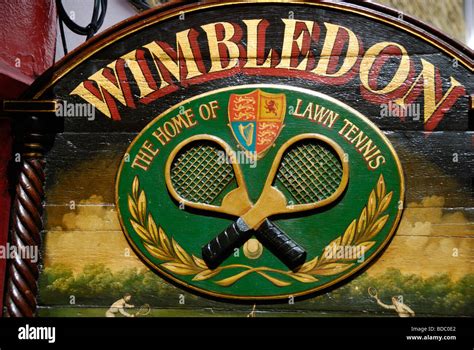 Old Hand Painted Wooden Advertising Sign Promoting The Wimbledon Lawn