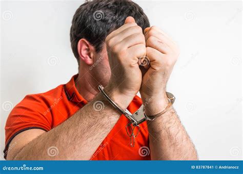 Arrested Man In Handcuffs Hidden His Face Stock Image Image Of