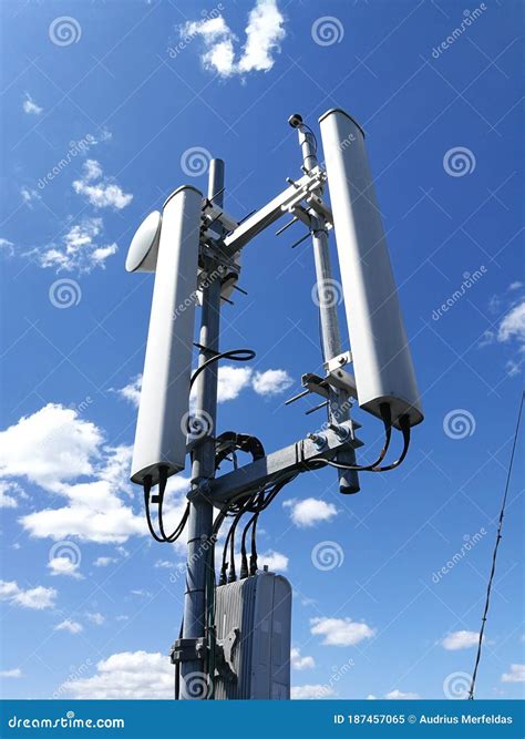 Gsm Base Station Antenna In Front Of Blue Cloudy Sky Stock Image