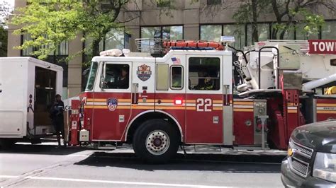 FDNY TOWER LADDER 22 RESPONDING WITH LOTS OF AIR HORN IN HEAVY TRAFFIC