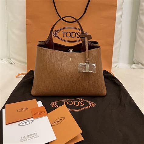 早い者勝ち TOD S トッズ レザーバッグ マイクロ ブラウン ハンドバッグ ip psd ku ac th