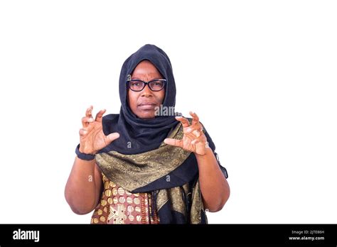 Muslim Mature Woman Wearing Glasses And Veil Angry Trying To Strangle