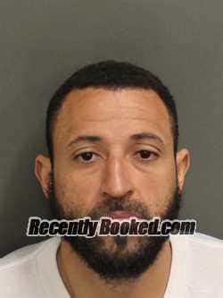 Recent Booking Mugshot For ALEX OMAR SANTIAGORAMIREZ In Orange County