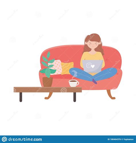 Stay At Home Woman Using Laptop Sitting On Sofa In The Living Room