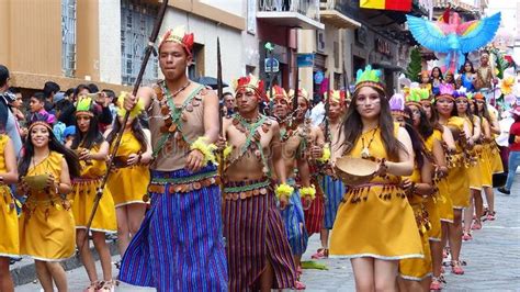 Folk dancers represent culture of Shuar, Ecuador. Cuenca, Ecuador ...