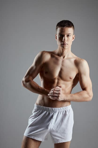 Premium Photo Athlete With Inflated Torso Joined Hands Near Chest On