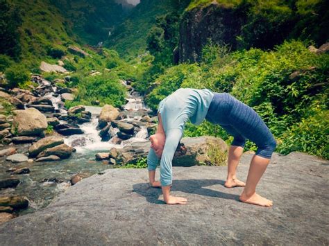 Premium Photo Woman Doing Ashtanga Vinyasa Yoga Asana Urdhva Dhanurasana