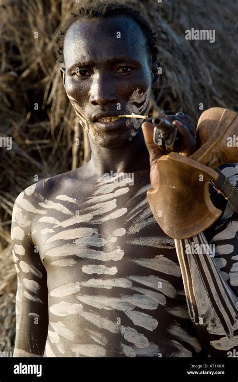 Karo Man In White Clay Body Paint Carrying His Self Made Seat Dus Omo