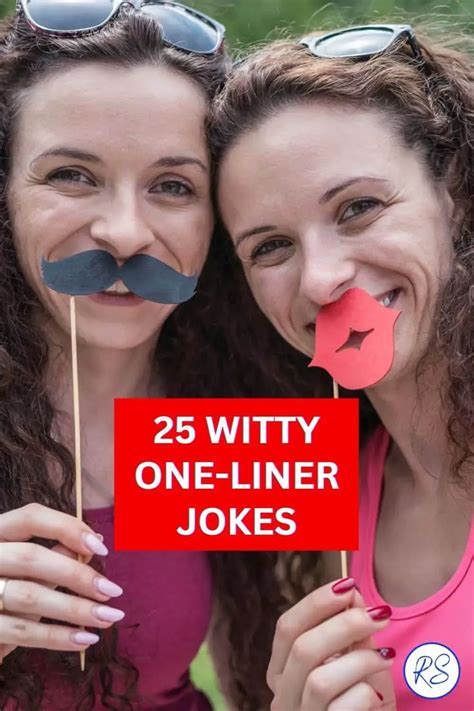 Two Women With Fake Moustaches On Their Faces And One Holding A Sign