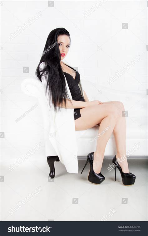Brunette Sexy Woman Sitting On White Stock Photo Edit Now