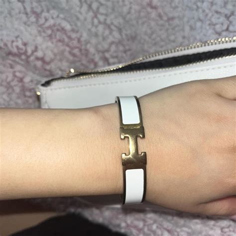 Hermès Clic H bracelet in gold with white... - Depop