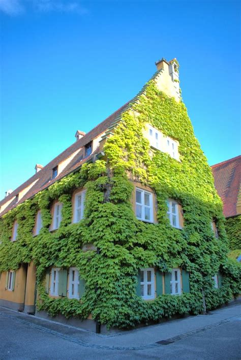 Buildings in the Old Fuggerei in Augsburg in Germany 4.7.2020 Editorial ...