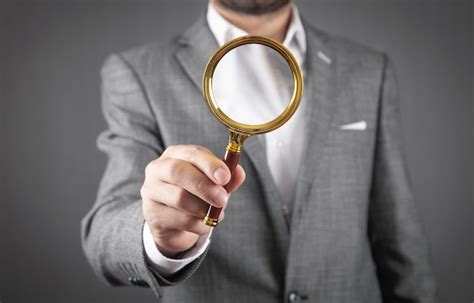 Premium Photo Caucasian Businessman Holding Magnifying Glass