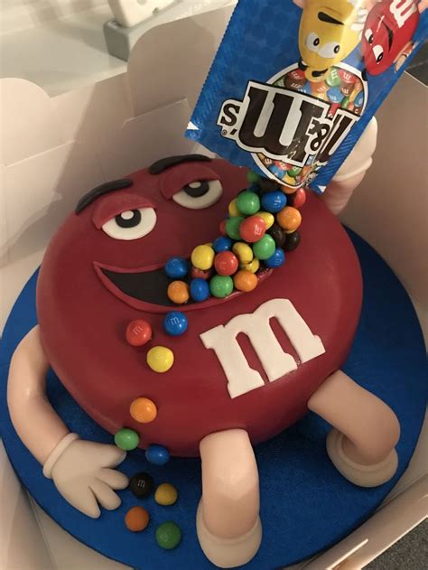 A Birthday Cake With M And M Candies On It