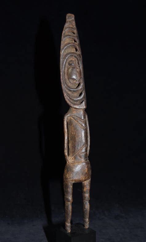 Lot A Fine Old Misigini River Ancestor Figure With Opposing Hooks On