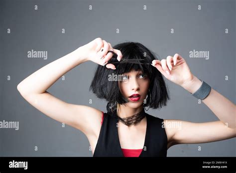 Haircut Beautiful Woman With Hairdressers Scissors And Short Brunette Hair Cut Her Hair Women