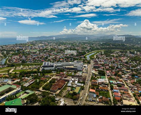 Aerial Survey Of Iligan City With Modern And Commercial Buildings
