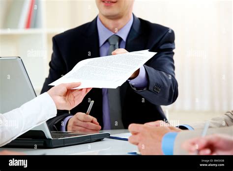 Handing Over Documents Hi Res Stock Photography And Images Alamy