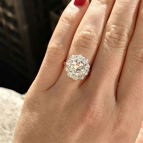 Francesca S Diamond Ring Round With Smaller Ones Circling It Ct