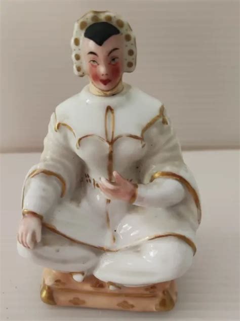 STATUETTE EN PORCELAINE Flacon représentant un personnage EUR 35 00