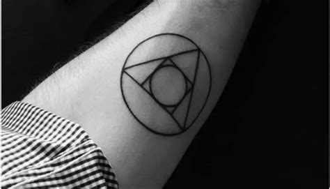 Circle with Triangle Inside Tattoo Meaning & Symbolism (Recovery)