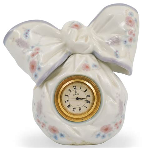 Sold Price Lladro Porcelain Bow Clock June 2 0120 400 Pm Edt