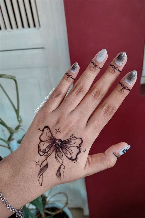 25 Mesmerizing Henna Designs Bow Henna On Hand Bow Rings I Take You